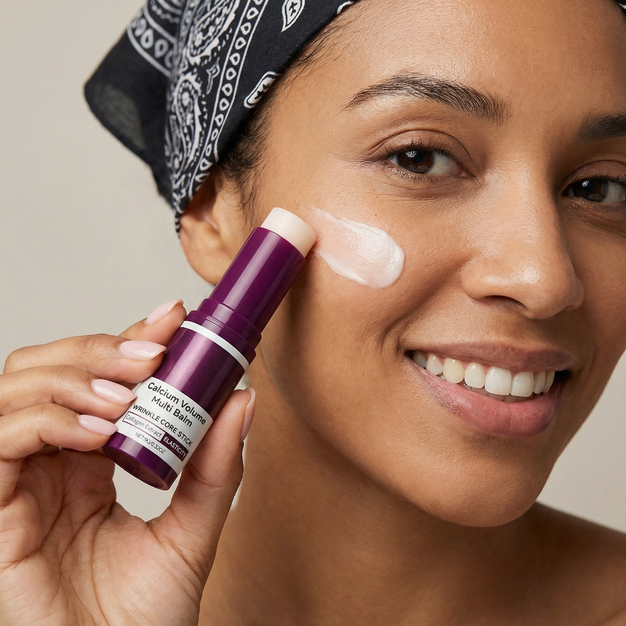 Woman applying cream to her face with a purple bottle labeled 'Calcium Volume' on a neutral background